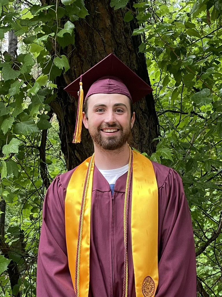 Hayden Frey graduation portrait outdoors